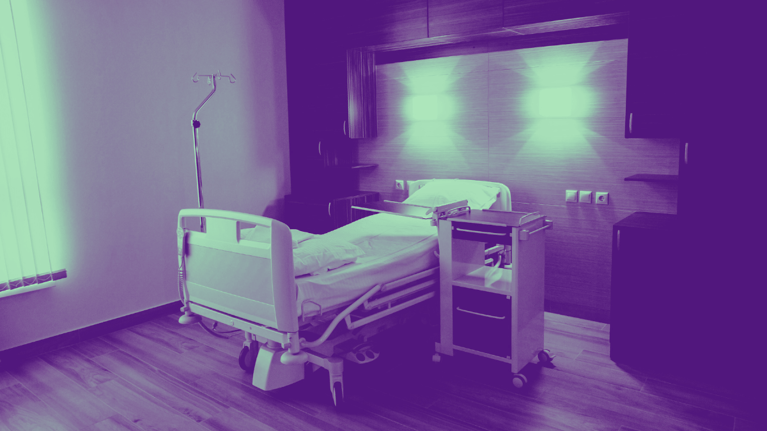 A hospital bed in a minty filter