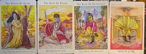 A spread of tarot cards from the Next World Tarot by Cristy C. Road